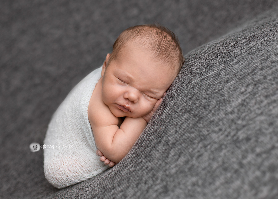 newborn photographer fort st john newborn pose on beanbag