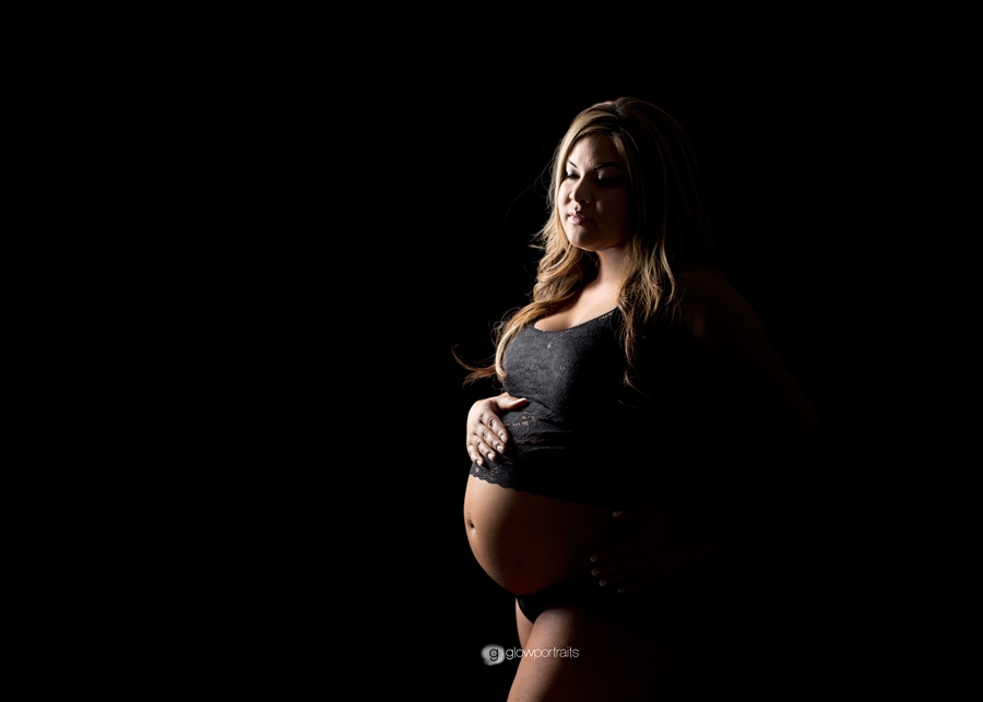 fprt st john, bc pregnancy photographer black background, maternity pose silhouette