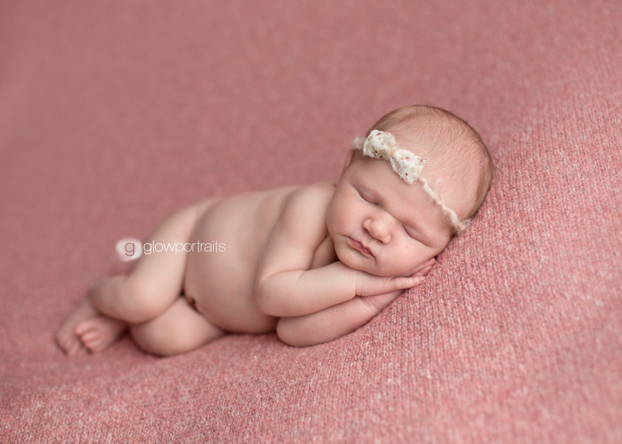 fort st john newborn photographer praying newborn beanbag pose