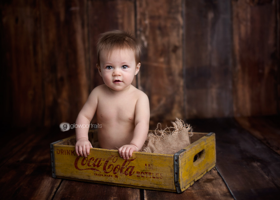 baby in wooden box 