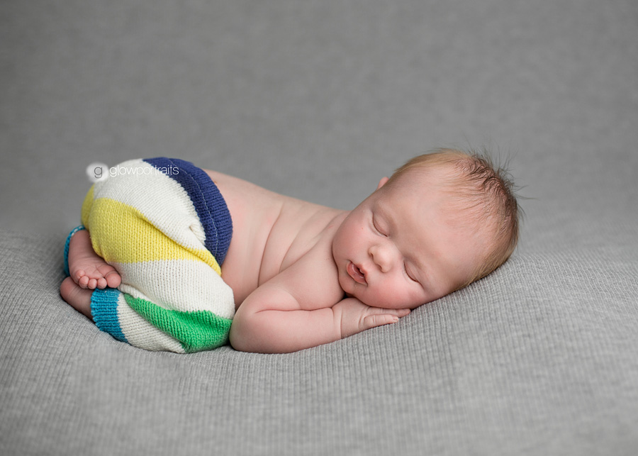 glow portraits fort st john, bc beanbag pose for newborn with pants