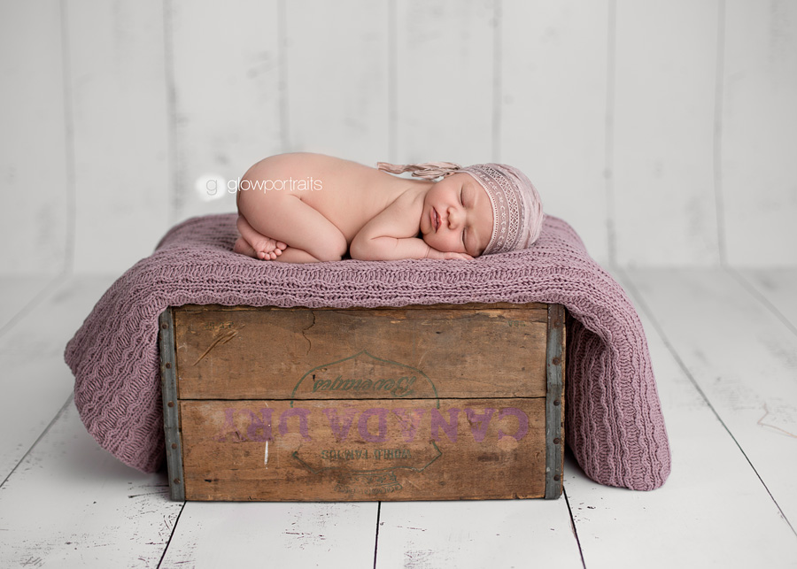 newborn photography baby on box