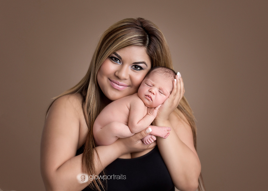 peace river newborn photographer mom and baby girl pose