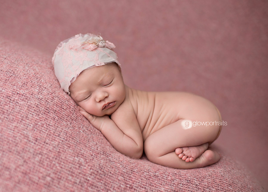 newborn photographer canada bum in air beanbag pose