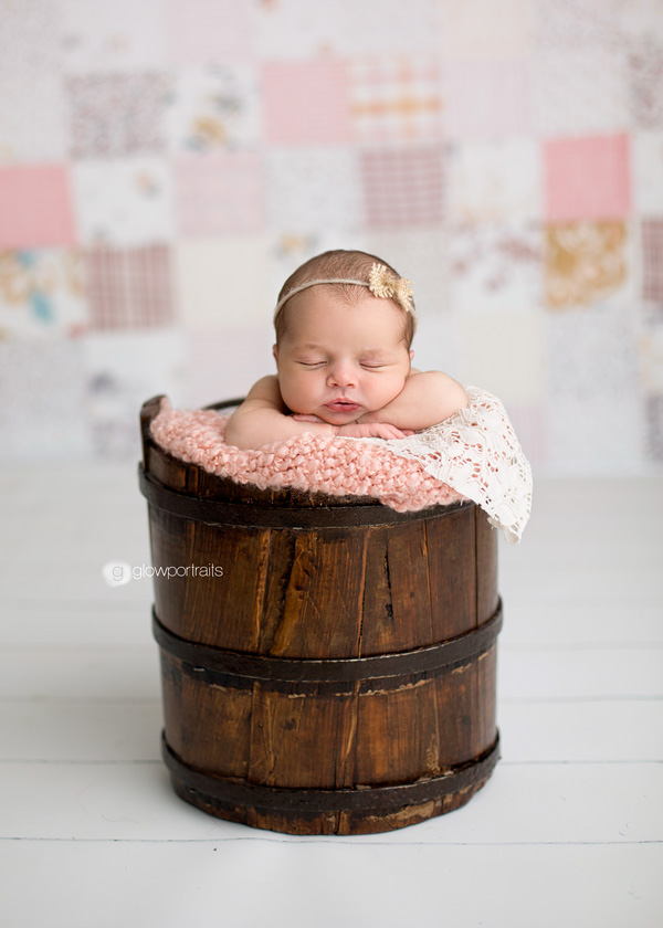 newborn in bucket