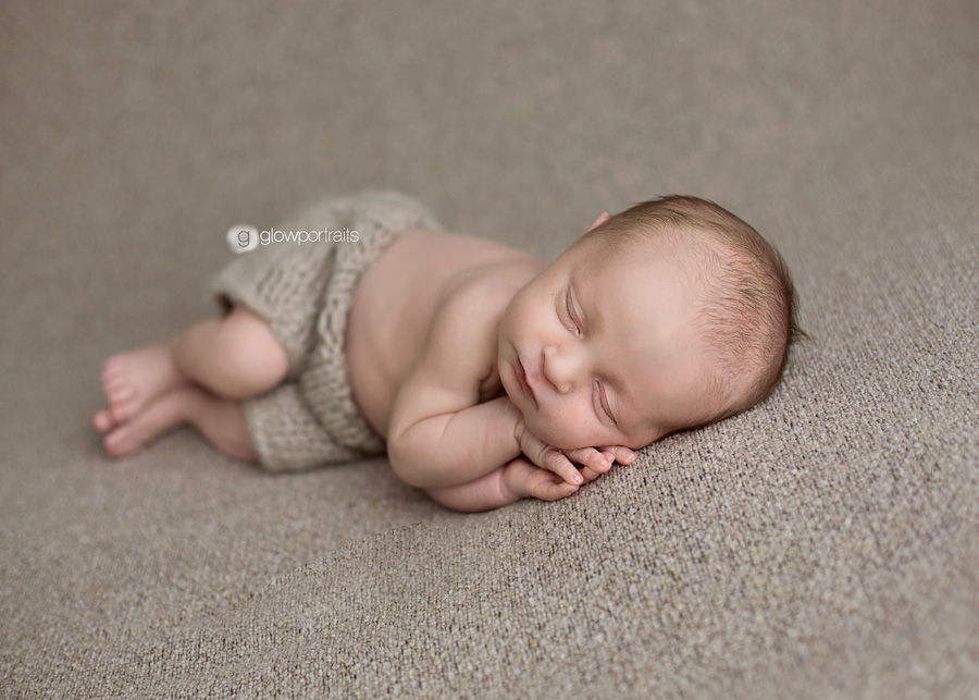 british columbia newborn photographer lying side pose baby