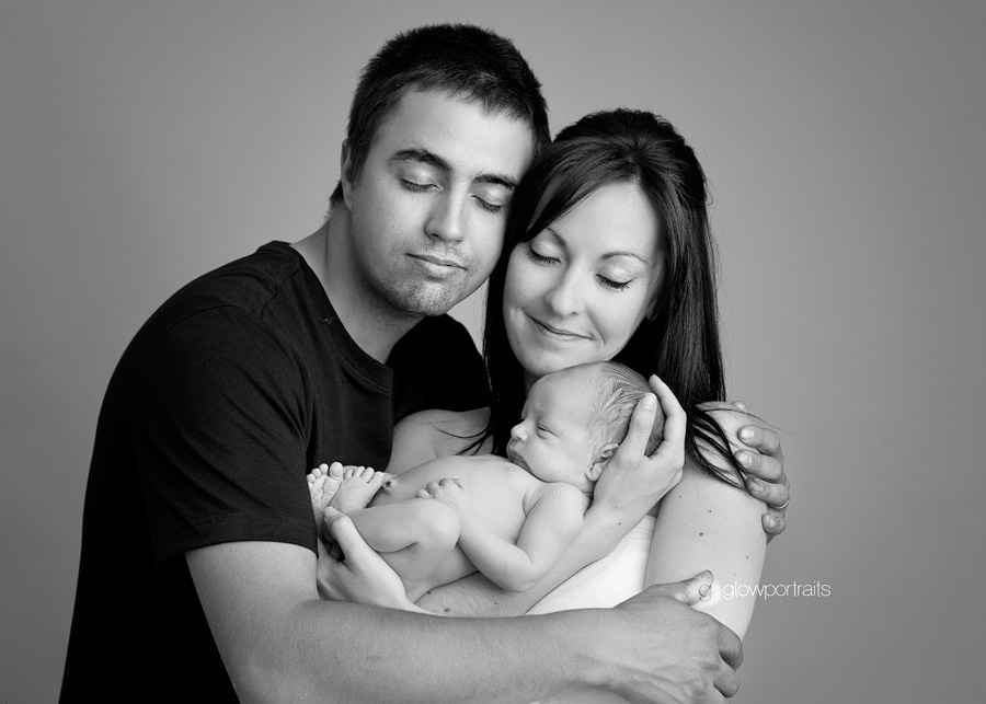 grande prairie newborn photographer mom dad and newborn pose