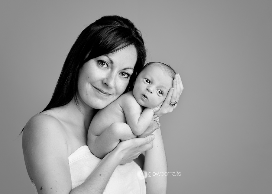 newborn photography mom holding newborn