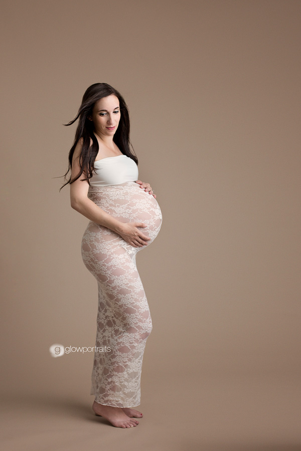 maternity posing with long lace dress