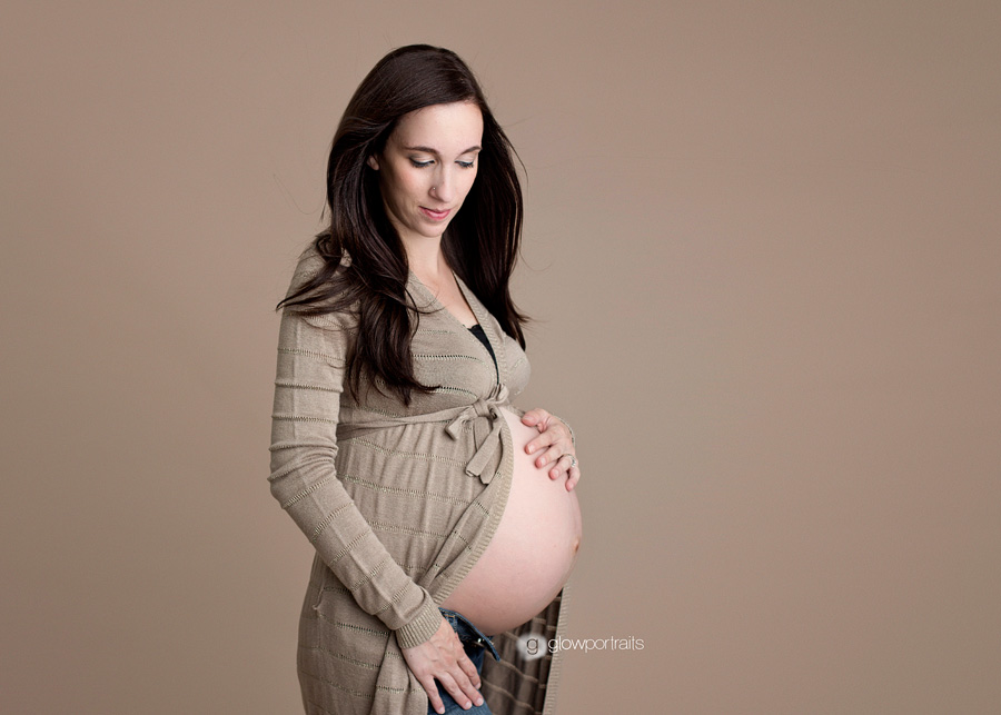 maternity posing wearing sweater
