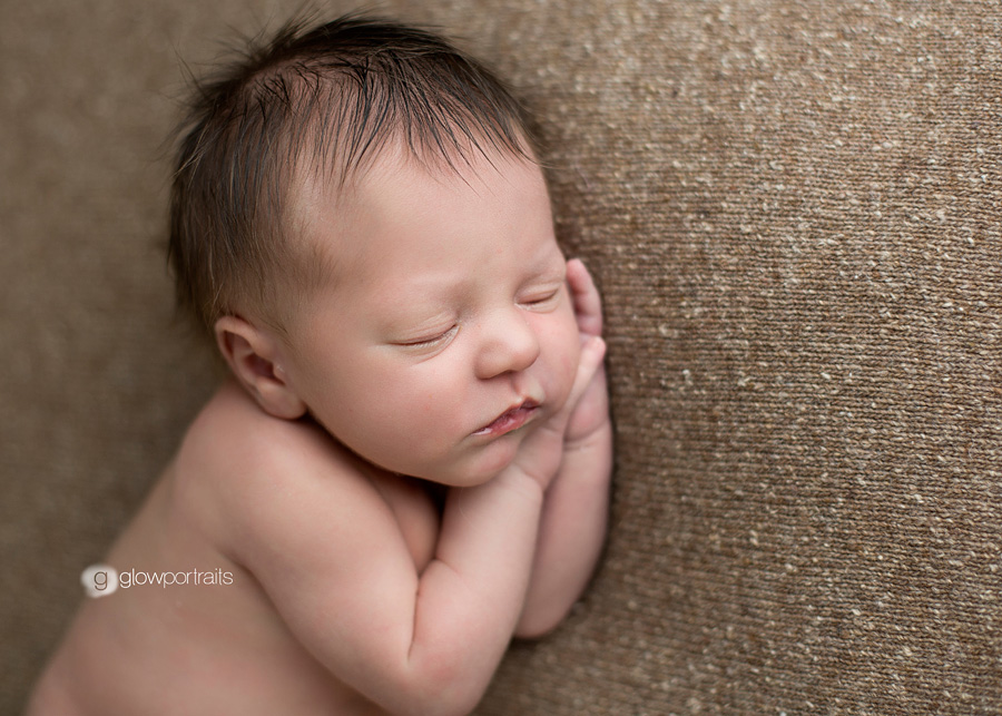 close up of newborn on beanbag