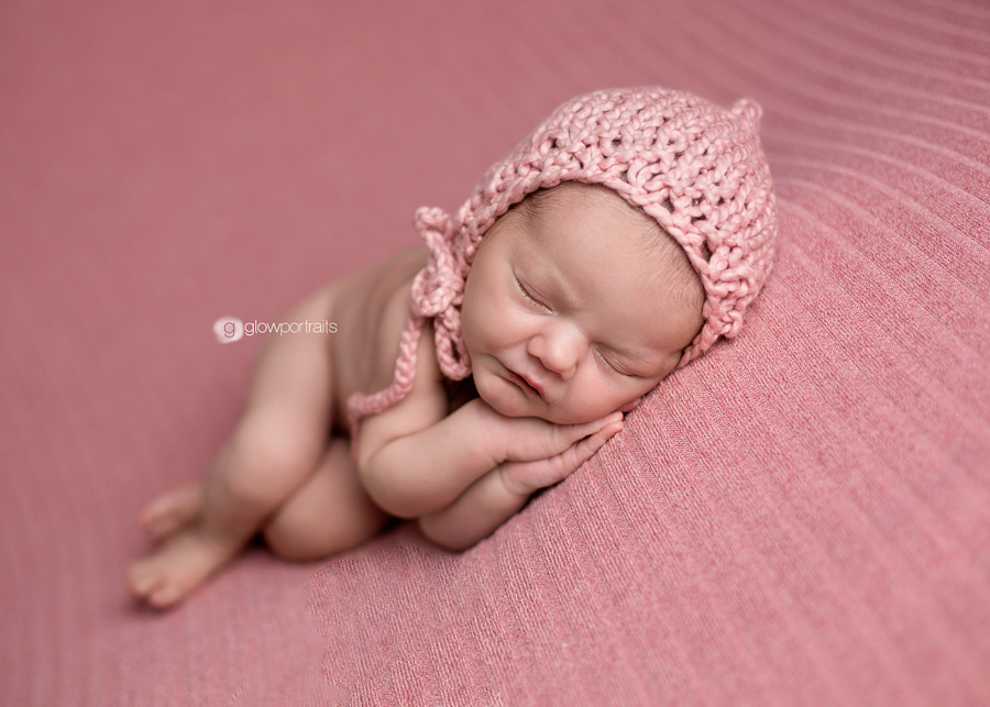 lying side pose on pink beanbag