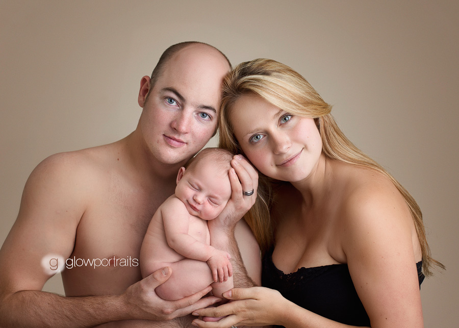 fort st john newborn photographer newborn posing with mom and dad