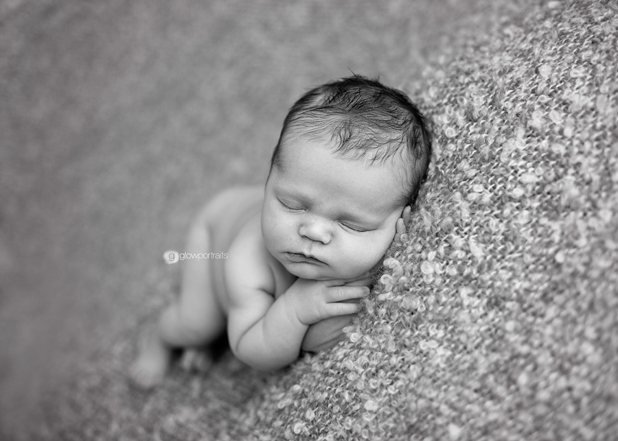 baby lying side pose newborn photography