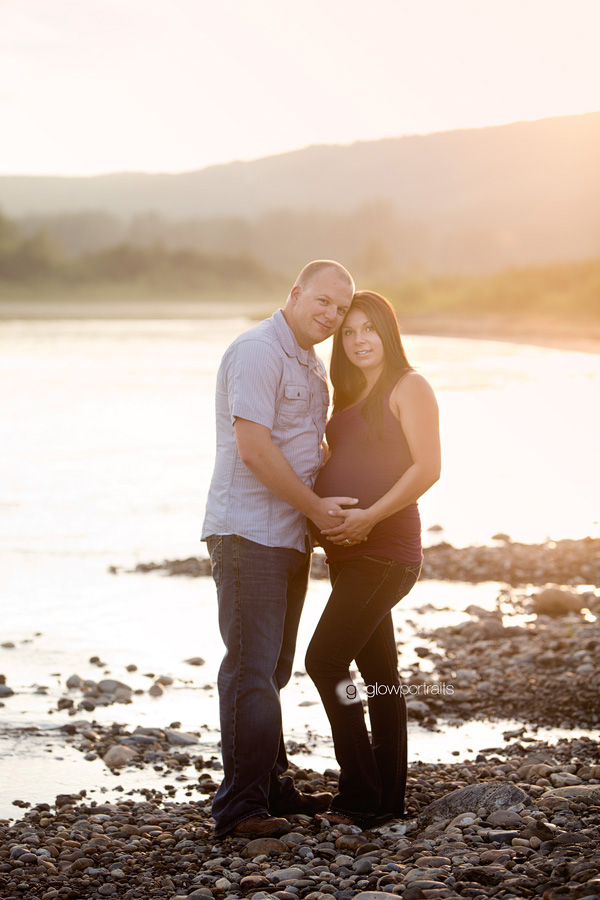 couple outside for maternity photograph