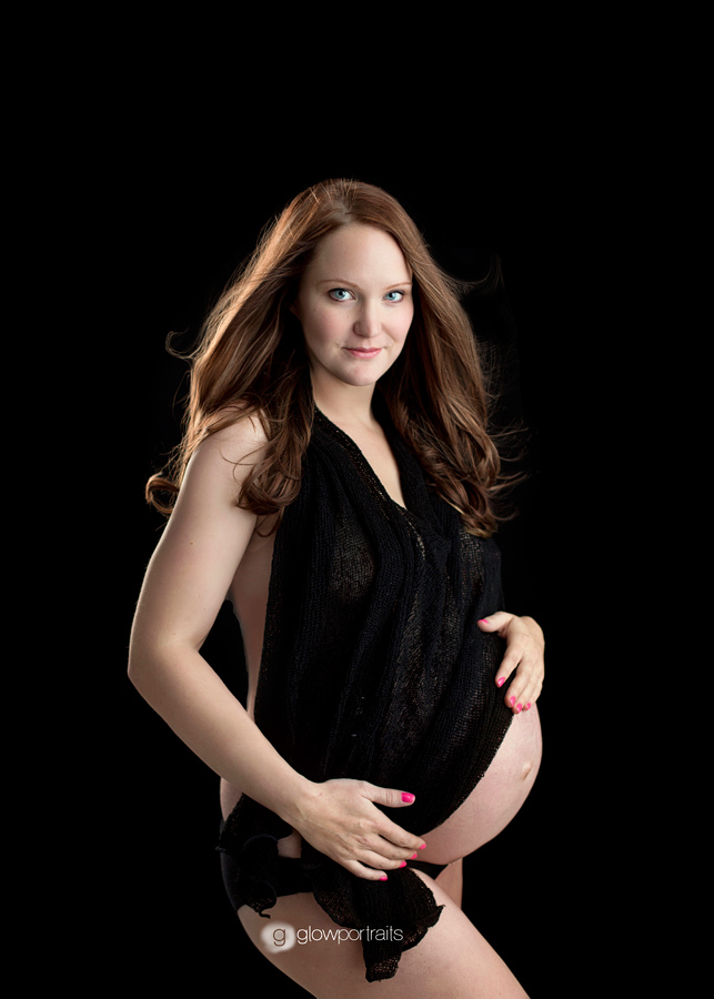 maternity photographer fort st john, bc black backdrop maternity pose