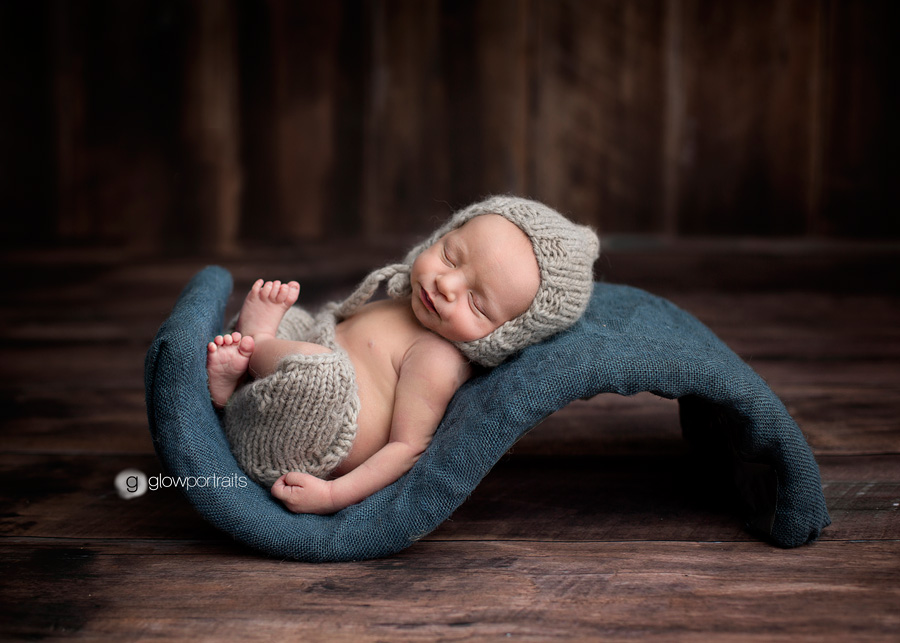 baby boy in curled position