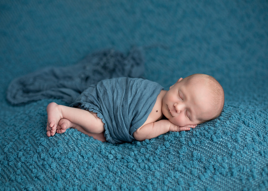 beanbag pose on blue fabric