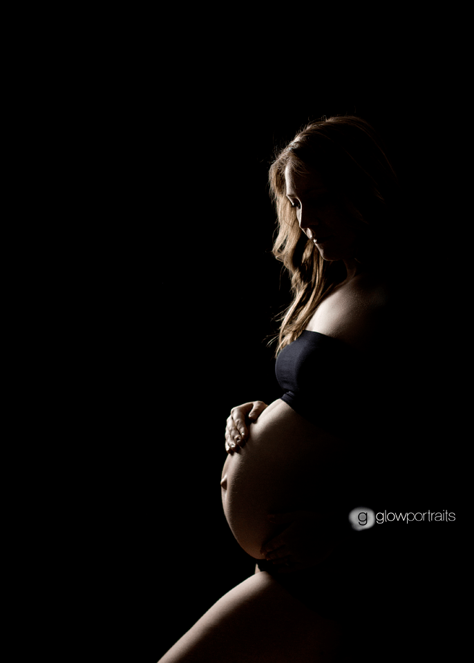 silhouette maternity pose with strip light box