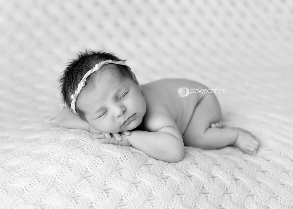 baby lying on beanbag photography pose