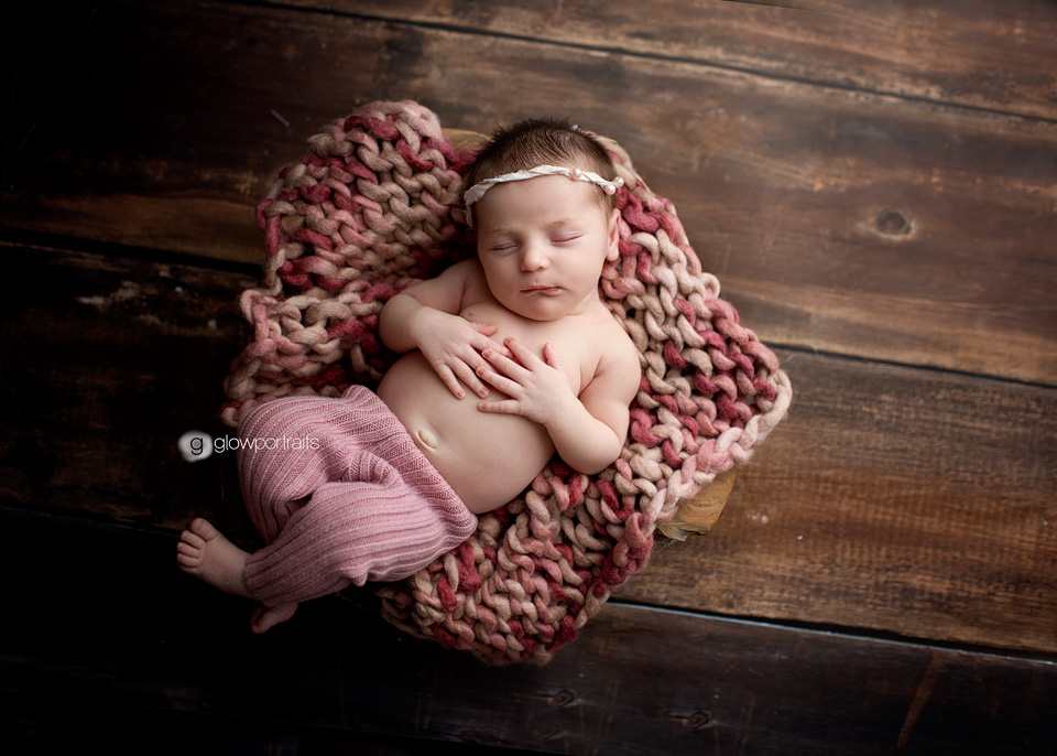 overhead photography image of newborn in bowl