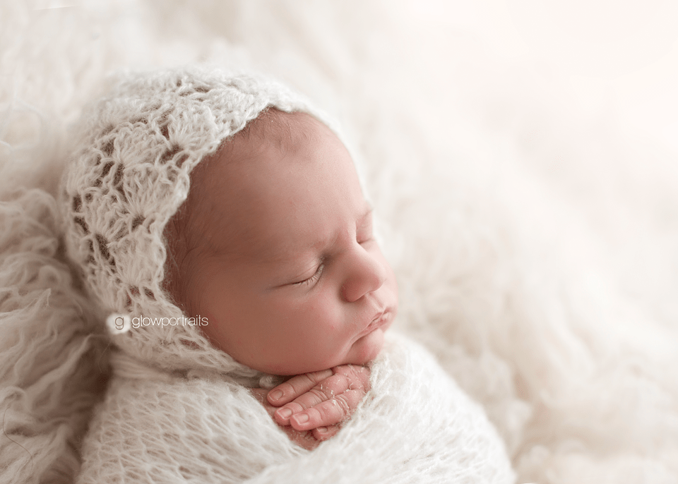 side light newborn wearing cream
