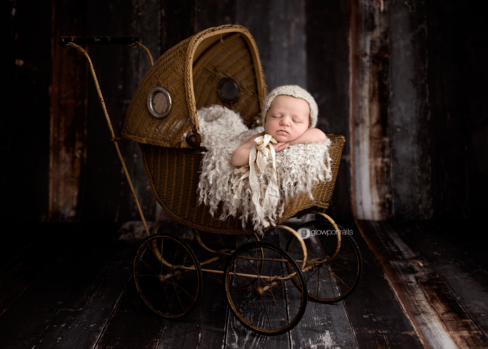 newborn baby in baby carriage