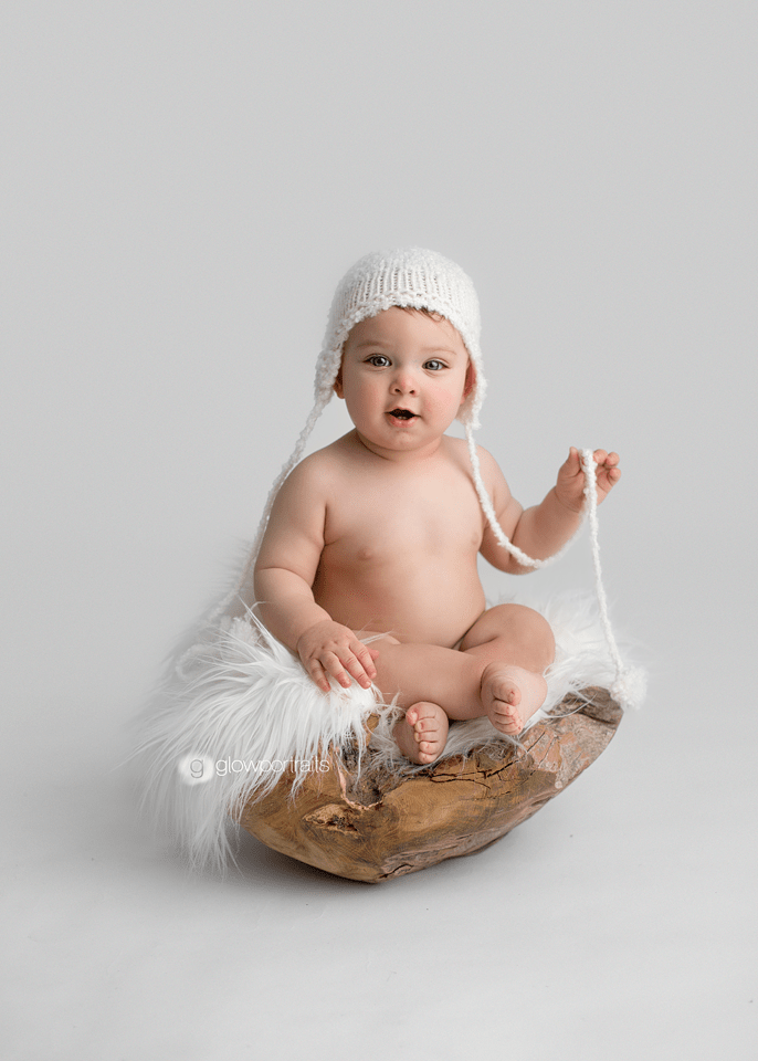 baby boy wearing white hat