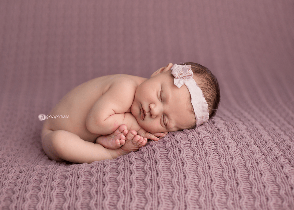taco pose on pink fabric