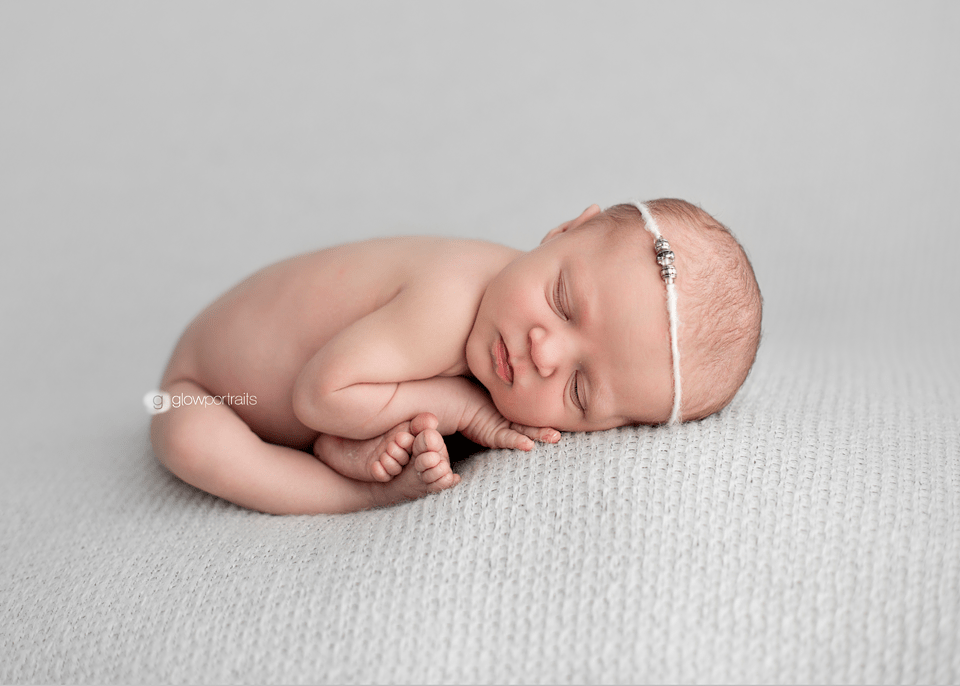 taco pose on gray fabric